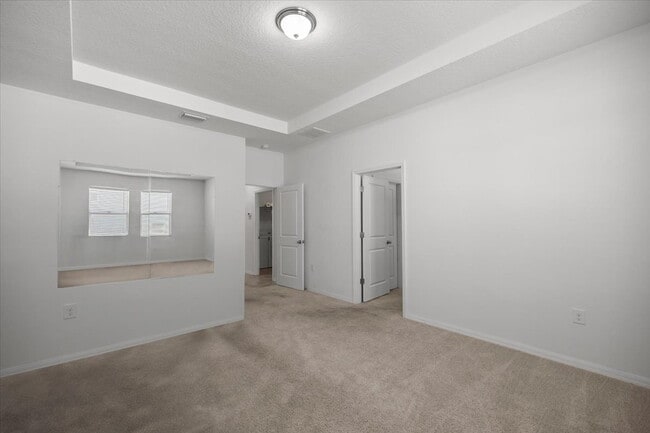 Building Photo - **Spacious 4-Bedroom, 3.5-Bath Home with Private Guest Suite and 3-Car Garage**