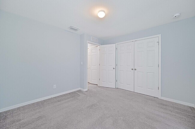 Building Photo - Spacious Three-Bedroom Home with Open Floor Plan, Large Yard