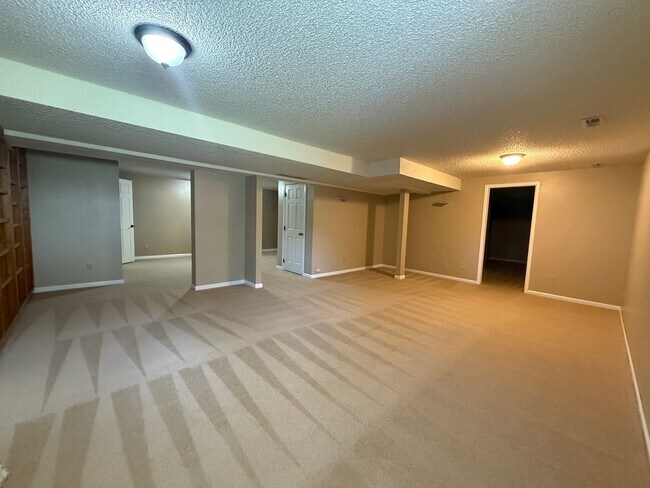 Building Photo - 5BD/4BA/3 car garage w Flat Yard Cheyenne ...