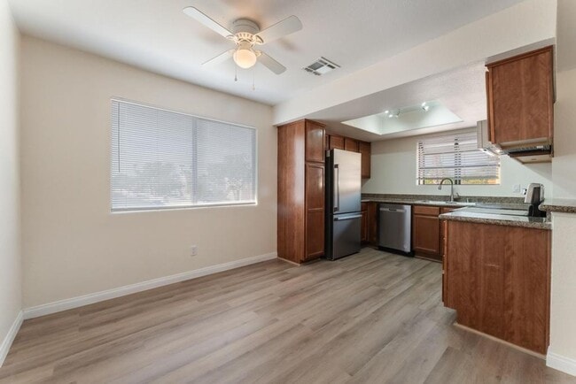 Building Photo - This beautifully renovated 2-bedroom, 2-bath condo is ready for immediate move-in!