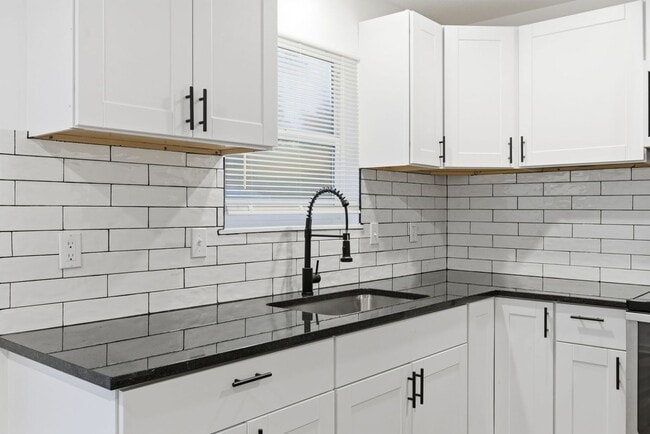 Building Photo - Everything upgraded on this 4 bedroom — to...