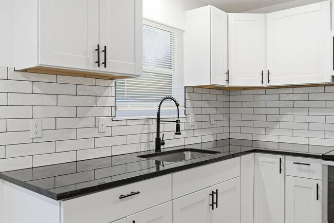 Building Photo - Everything upgraded on this 4 bedroom — top-notch finishes throughout!