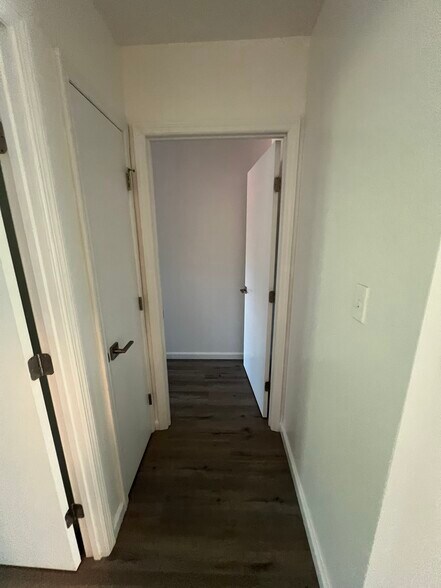 Hallway to 2nd bedroom with closet space - 1835 Atlantic Ave