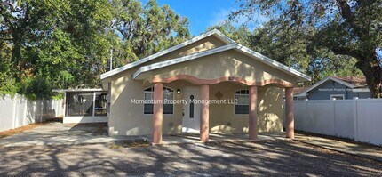 Building Photo - Spacious 3-Bedroom, 2-Bath Home with Covered Screened Porch & Large Kitchen in Tampa