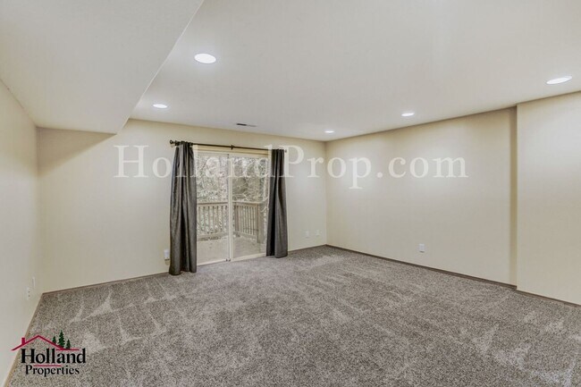 Building Photo - Serene 4-Bed Home with Huge Common Room & Deck!