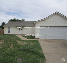 Building Photo - Home 3 Bedrooms, 2 Bathrooms, 2 Car Garage
