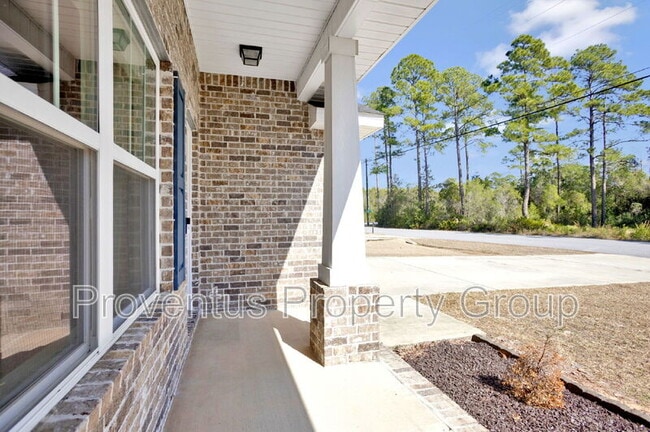 Building Photo - 7198 Gordon Evans Rd