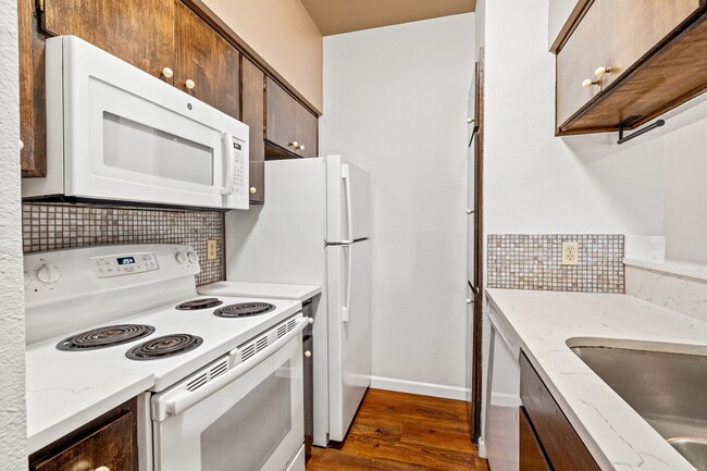 Building Photo - PARK PLACE - ACROSS FROM DKR STADIUM - 1BD / 1BA With Study - WOOD FLOORS - W/D - $1200