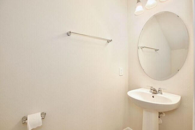 Building Photo - Immaculate Townhome · Dual En-Suite Bedrooms + Flex Loft · Cable & Internet Included · 3.5 Miles ...