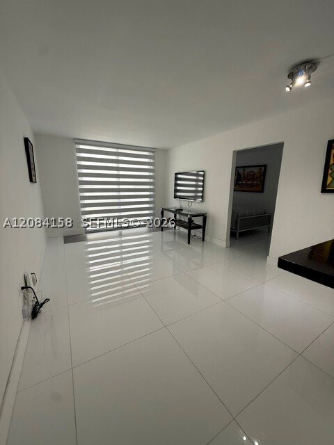 Building Photo - 5555 Collins Ave
