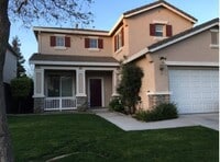 Building Photo - Spacious two-story home featuring 4 bedrooms and 3 full bathrooms (1 bedroom and 1 bathroom downs...