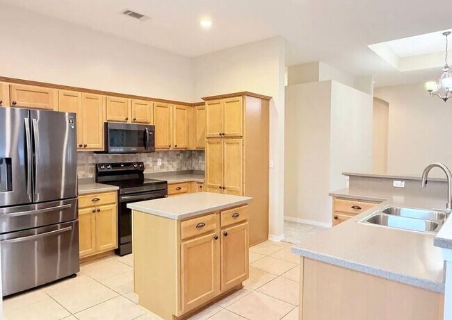 Building Photo - 5659 Tiger Woods Dr