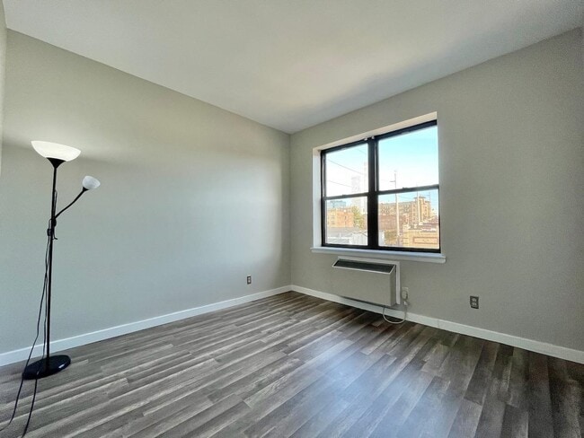 Building Photo - 43-49-49 Van Wagenen Ave