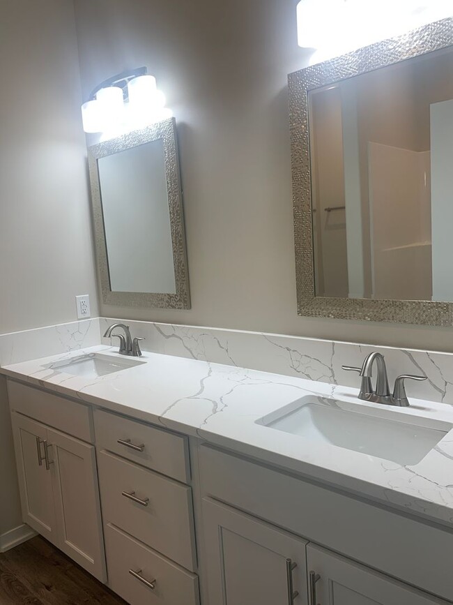 Building Photo - Walkout ranch townhome with 2 stall garage...