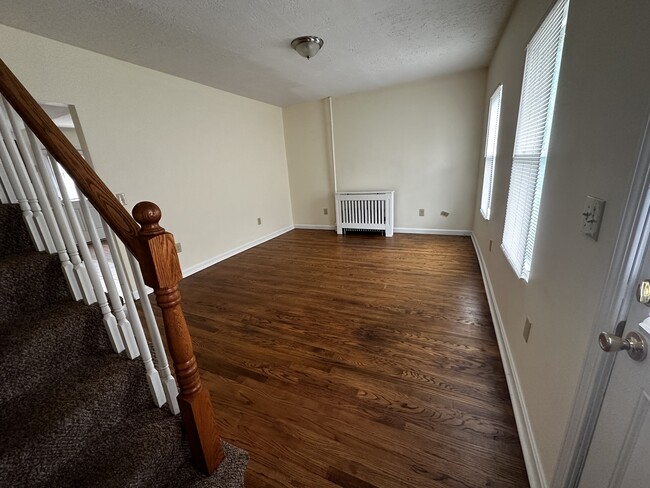 Living room from stairs to 2nd floor - 58 Lake St