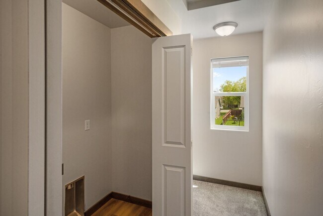 Building Photo - Pet Friendly! Gorgeous 3 Bedroom condo with double stall attached garages with AC.