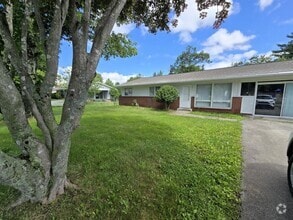 Building Photo - 3/2 with Fenced Yard; In-town and Near an ...