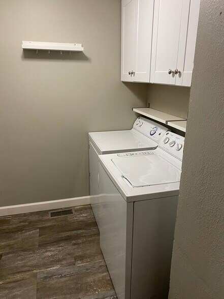 Your own laundry room with extra storage - 950 29th Ave NE