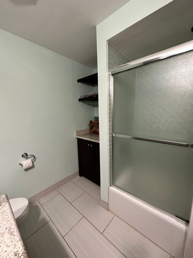 Building Photo - Dream Home in Highland, Michigan: Your Private Oasis on 5 Wooded Acres