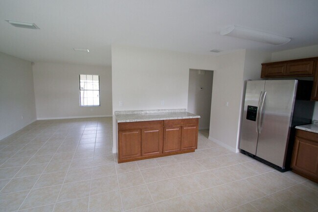 Building Photo - Waterfront 3BR Home on Canal | Spacious Yard | Lawn Care Included | Pet Friendly