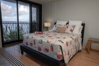 Building Photo - BEACH FRONT 2/2/1pkg, furnished condo on W...
