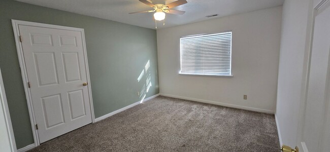 Building Photo - 8084 N Ridge Loop E