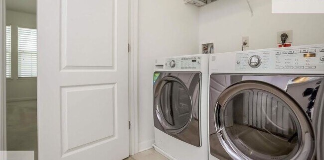 Second-floor Laundry (adjacent to Primary Suite) - 9714 Pine Arcade