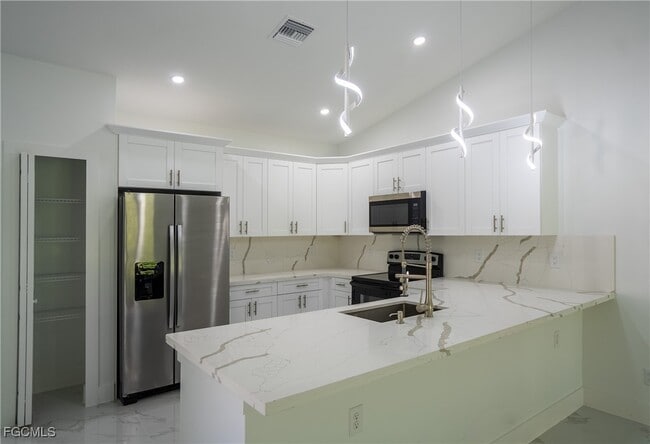 Building Photo - 4935 Leonard Blvd S