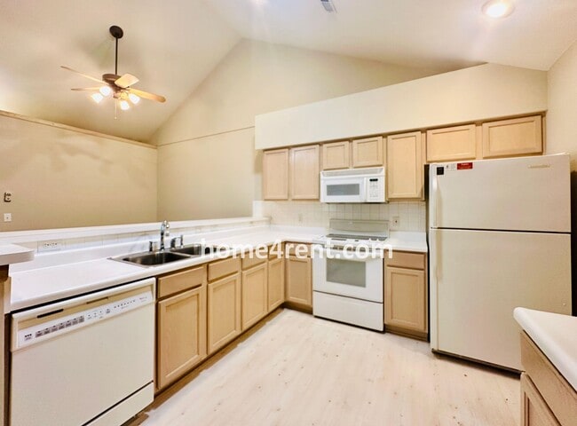 Building Photo - Maintenance FREE, Ranch Style Townhome w/ ...