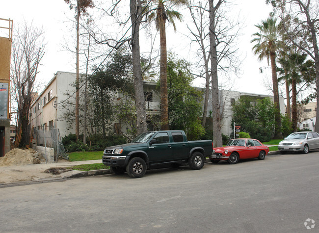 frontal tree obstruction. Rear view too narrow for clear shot. This is the best poss. alt. shot. - 5306 Hermitage Ave
