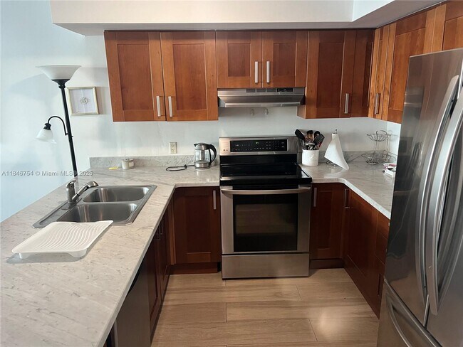 Building Photo - 9499 Collins Ave
