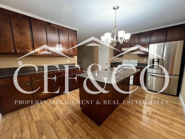 Building Photo - Beautiful 4 bedroom brick ranch now available!