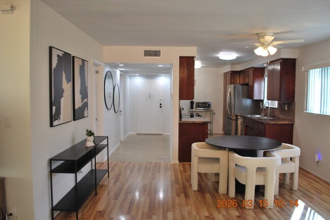 Dining and kitchen from entry - 612 N Louise St