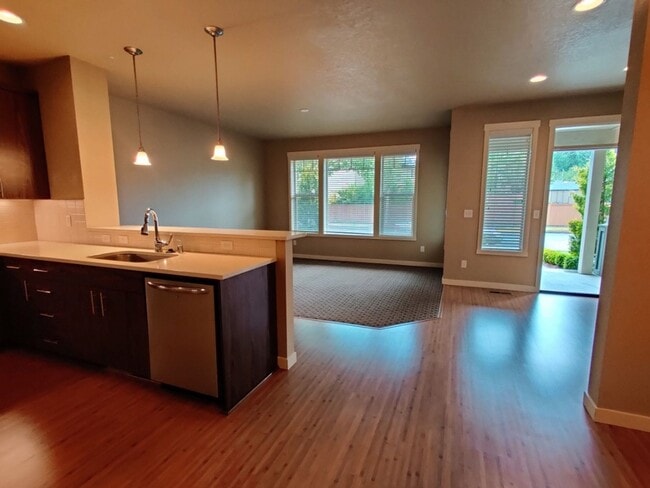 Building Photo - Modern Hawks Prairie Townhome