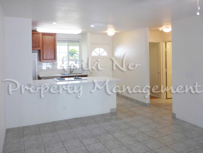 Building Photo - 75-6081 ALII DR, Apt D103