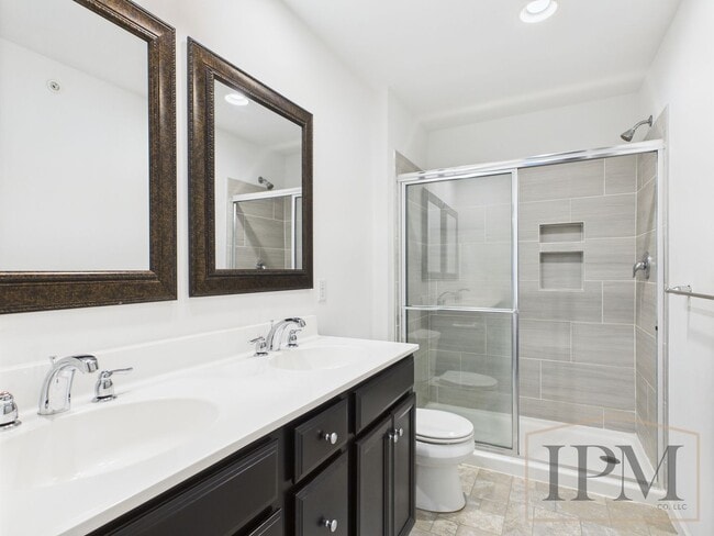Building Photo - 2-bedroom 2.5 bath Luxury Townhome located...