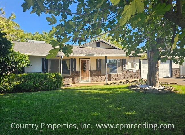 Building Photo - Price Reduced! Spacious House with Landsca...