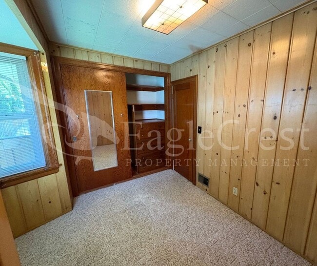 Building Photo - Three Bedroom, Two Bathroom House with Fenced Yard and Outdoor Fireplace