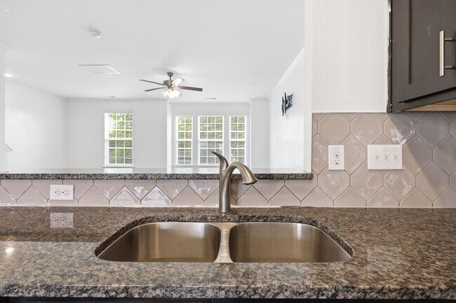 Building Photo - Modern 4BR Townhome with Washer/Dryer & Pet-Friendly Living in Morrisville!
