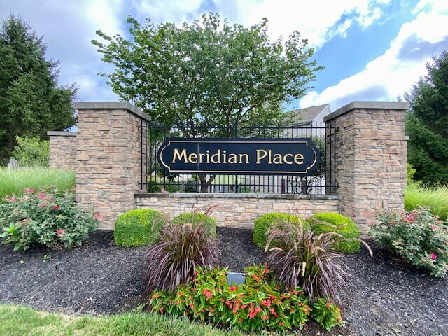 Building Photo - Welcome home to this stunning 3-bedroom, 2.5-bath residence in the desirable Meridian Place neigh...