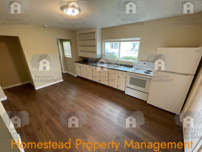 Building Photo - 219-219 1/2 S Monmouth Ave