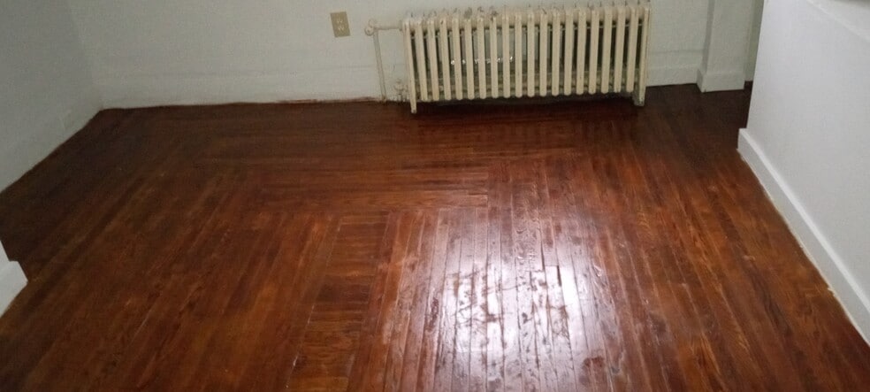 Bedroom 2 with luxurious Hardwood floors - 108 S Depot St