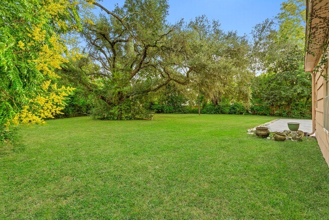 Building Photo - Charming Home with Expansive Backyard on a...