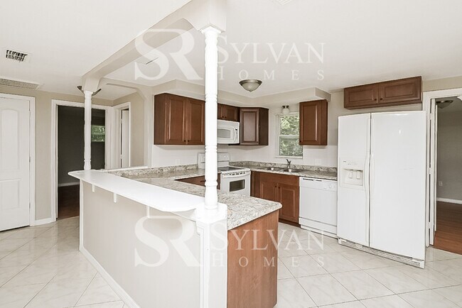 Building Photo - The living is easy in this 3 bedroom, 1 bathroom home