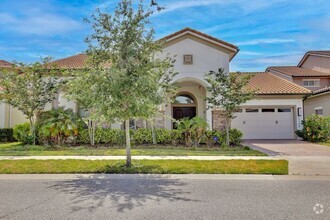 Building Photo - Luxurious 4/4 Executive Pool Home with a 3...