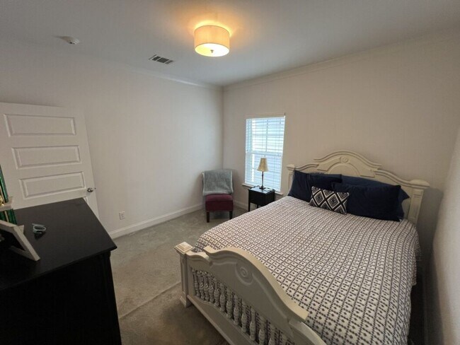 Building Photo - Luxury 4BR Home in Americana | 11 Ft Ceilings, Courtyard Living & Furnished Option