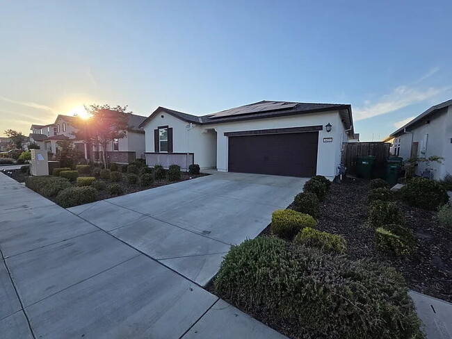 Building Photo - This stunning three-bedroom, two-bathroom home offers an incredible amount of space and upgrades,...