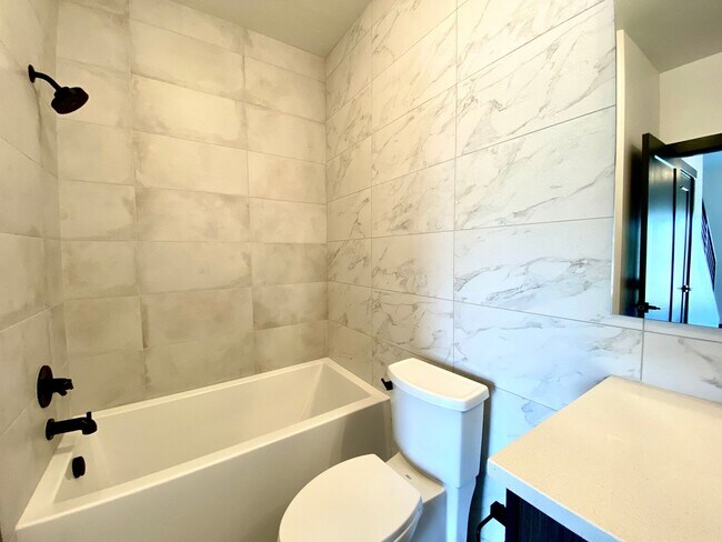 Building Photo - Close to Micron, 3 Bedroom 3 bath w/ a Mil...