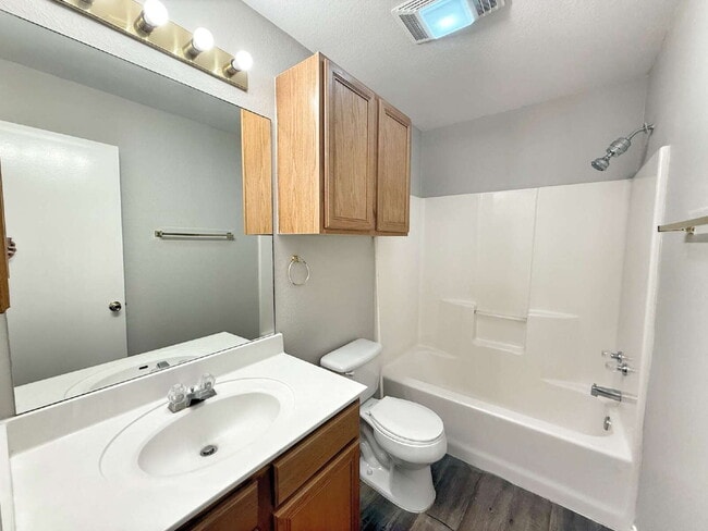 Building Photo - Spacious 3 Bedroom, 2 Bath Duplex with 1-Car Garage – Lawn Care Included!