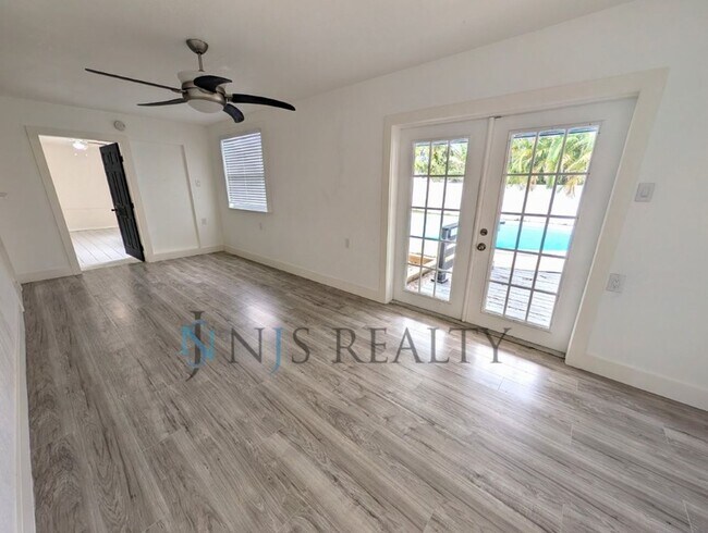 Building Photo - Beautiful 4/2/2 home with a POOL, 1700 Sq. Ft. with fenced yard, TONS of renovations